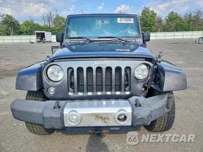 Piąte zdjęcie samochodu w środku: 2014 JEEP WRANGLER UNLIMITED SAHARA VIN:1C4HJWEG9EL203631 - miniatura