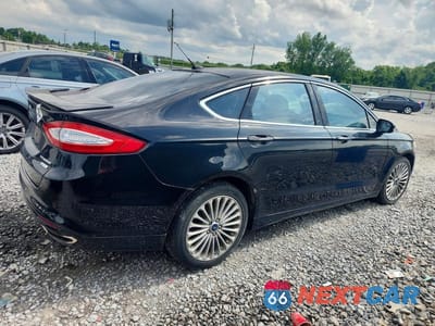 Trzecie zdjęcie samochodu z tyłu: 2016 FORD FUSION TITANIUM VIN:3FA6P0K92GR197691 - miniatura