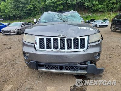 Piąte zdjęcie samochodu w środku: 2013 JEEP GRAND CHEROKEE OVERLAND VIN:1C4RJFCG2DC580629 - miniatura
