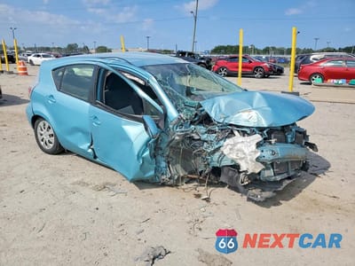 Czwarte zdjęcie samochodu z boku: 2014 TOYOTA PRIUS C TWO VIN:JTDKDTB32E1065052 - miniatura