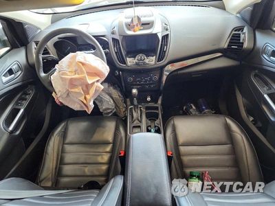 Zdjęcie 8 z 13 samochodu: 2017 FORD ESCAPE TITANIUM VIN:1FMCU9JD2HUD16958 - miniatura
