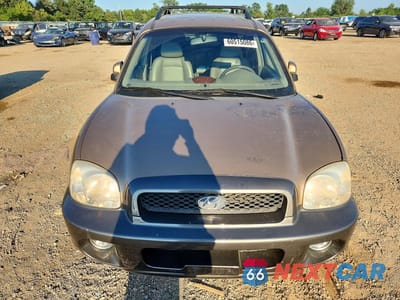 Piąte zdjęcie samochodu w środku: 2002 HYUNDAI SANTA FE GLS VIN:KM8SC73D32U314028 - miniatura