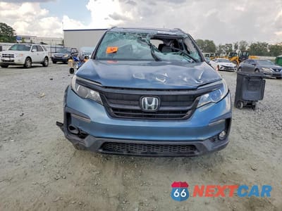 Piąte zdjęcie samochodu w środku: 2021 HONDA PILOT SE VIN:5FNYF5H20MB028974 - miniatura