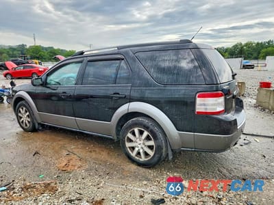 Drugie zdjęcie samochodu z przodu: 2009 FORD TAURUS X SEL VIN:1FMDK02W79GA02454 - miniatura