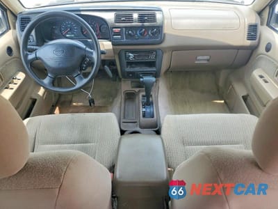 Zdjęcie 8 z 12 samochodu: 2000 NISSAN FRONTIER XE VIN:1N6ED27T0YC412996 - miniatura