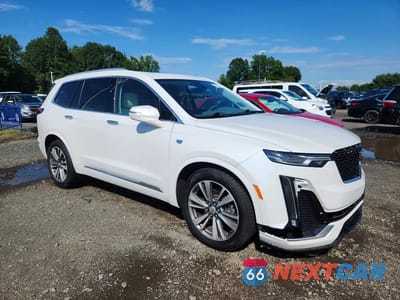 Czwarte zdjęcie samochodu z boku: 2021 CADILLAC XT6 PREMIUM LUXURY VIN:1GYKPDRS6MZ153865 - miniatura