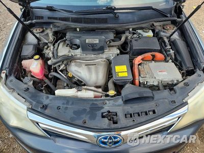 Zdjęcie 11 z 12 samochodu: 2012 TOYOTA CAMRY HYBRID XLE VIN:4T1BD1FK0CU027607 - miniatura