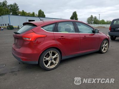 Trzecie zdjęcie samochodu z tyłu: 2016 FORD FOCUS TITANIUM VIN:1FADP3N21GL301769 - miniatura