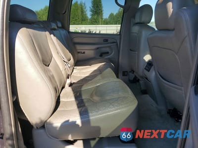 Zdjęcie 11 z 13 samochodu: 2004 CHEVROLET SUBURBAN K1500 VIN:1GNFK16Z54J157885 - miniatura