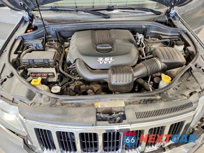 Zdjęcie 12 z 13 samochodu: 2012 JEEP GRAND CHEROKEE LAREDO VIN:1C4RJFAG2CC132912 - miniatura