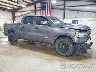 Czwarte zdjęcie samochodu z boku: 2023 RAM 1500 LARAMIE VIN:1C6SRFJTXPN617386 - miniatura