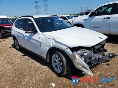 Czwarte zdjęcie samochodu z boku: 2014 BMW X1 XDRIVE28I VIN:WBAVL1C57EVY20240 - miniatura
