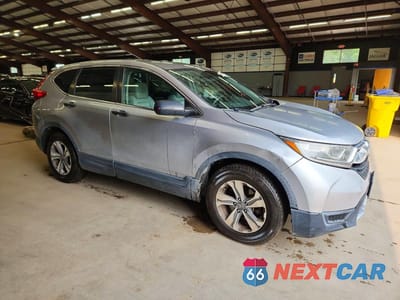 Czwarte zdjęcie samochodu z boku: 2018 HONDA CR-V LX VIN:2HKRW5H38JH415444 - miniatura