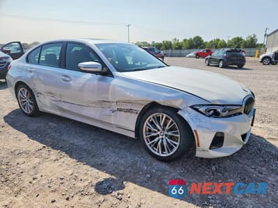 Czwarte zdjęcie samochodu z boku: 2023 BMW 330XI VIN:3MW89FF09P8D31448 - miniatura