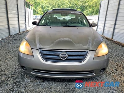 Piąte zdjęcie samochodu w środku: 2003 NISSAN ALTIMA 2.5 VIN:1N4AL11DX3C110548 - miniatura