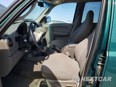Zdjęcie 7 z 13 samochodu: 2003 JEEP LIBERTY SPORT VIN:1J8GL48K13W720338 - miniatura