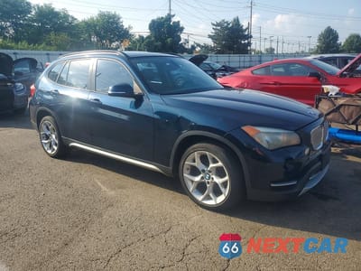 Czwarte zdjęcie samochodu z boku: 2013 BMW X1 XDRIVE28I VIN:WBAVL1C50DVR83665 - miniatura