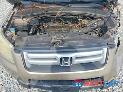 Zdjęcie 12 z 13 samochodu: 2006 HONDA PILOT EX VIN:5FNYF28596B024806 - miniatura