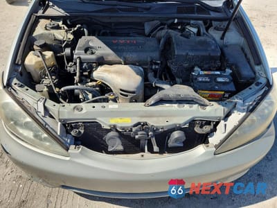 Zdjęcie 11 z 12 samochodu: 2005 TOYOTA CAMRY LE VIN:4T1BE32K55U429608 - miniatura
