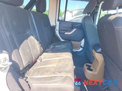 Zdjęcie 10 z 12 samochodu: 2017 JEEP WRANGLER UNLIMITED SAHARA VIN:1C4BJWEG7HL594174 - miniatura