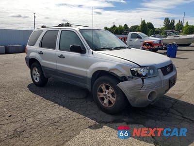 Czwarte zdjęcie samochodu z boku: 2006 FORD ESCAPE XLT VIN:1FMYU93106KC74808 - miniatura