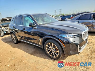 Czwarte zdjęcie samochodu z boku: 2025 BMW X5 XDRIVE40I VIN:5UX23EU03S9Y54954 - miniatura