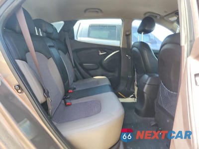 Zdjęcie 11 z 13 samochodu: 2011 HYUNDAI TUCSON GLS VIN:KM8JU3AC6BU261837 - miniatura