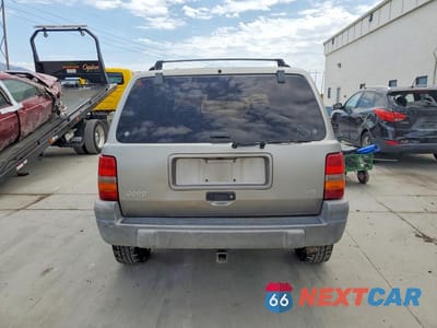 Zdjęcie 6 z 13 samochodu: 1998 JEEP GRAND CHEROKEE LAREDO VIN:1J4GZ58Y2WC157042 - miniatura