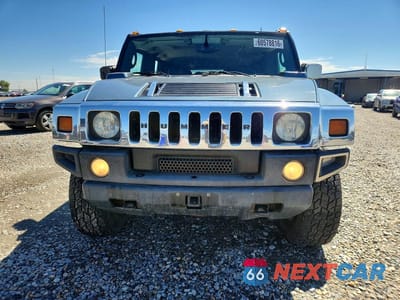Piąte zdjęcie samochodu w środku: 2005 HUMMER H2 VIN:5GRGN23U15H116762 - miniatura