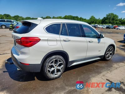 Trzecie zdjęcie samochodu z tyłu: 2018 BMW X1 XDRIVE28I VIN:WBXHT3C38J5K31303 - miniatura