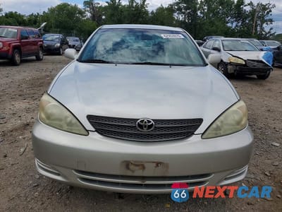 Piąte zdjęcie samochodu w środku: 2003 TOYOTA CAMRY LE VIN:JTDBE32K230169676 - miniatura