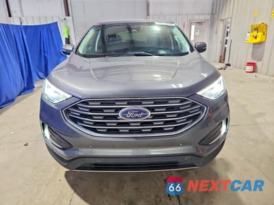 Piąte zdjęcie samochodu w środku: 2023 FORD EDGE TITANIUM VIN:2FMPK4K92PBA60006 - miniatura
