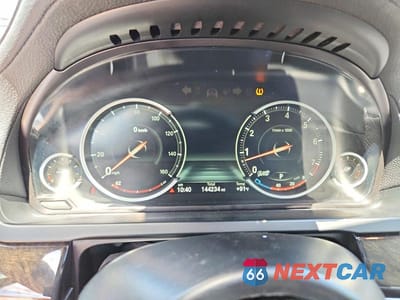 Zdjęcie 9 z 12 samochodu: 2014 BMW 740 LI VIN:WBAYE4C5XED138421 - miniatura