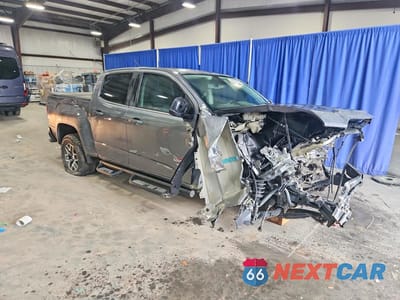 Czwarte zdjęcie samochodu z boku: 2019 GMC CANYON ALL TERRAIN VIN:1GTG6FENXK1150103 - miniatura