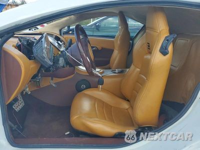Zdjęcie 7 z 13 samochodu: 2004 PONTIAC GTO VIN:6G2VX12G84L270073 - miniatura