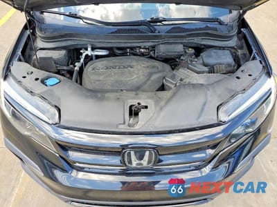 Zdjęcie 12 z 13 samochodu: 2021 HONDA PILOT SE VIN:5FNYF5H20MB022141 - miniatura