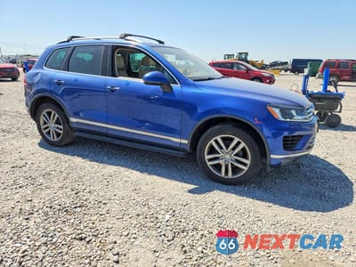 Czwarte zdjęcie samochodu z boku: 2016 VOLKSWAGEN TOUAREG SPORT VIN:WVGEF9BP2GD010093 - miniatura