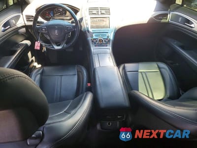 Zdjęcie 8 z 12 samochodu: 2017 LINCOLN MKZ HYBRID PREMIERE VIN:3LN6L5KU9HR645624 - miniatura