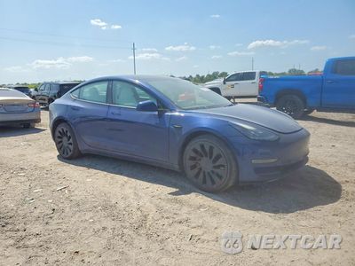 Czwarte zdjęcie samochodu z boku: 2023 TESLA MODEL 3 VIN:5YJ3E1EC1PF591832 - miniatura