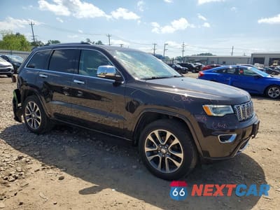 Czwarte zdjęcie samochodu z boku: 2017 JEEP GRAND CHEROKEE OVERLAND VIN:1C4RJFCG9HC843950 - miniatura