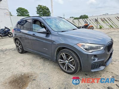 Czwarte zdjęcie samochodu z boku: 2016 BMW X1 XDRIVE28I VIN:WBXHT3C32G5E49233 - miniatura