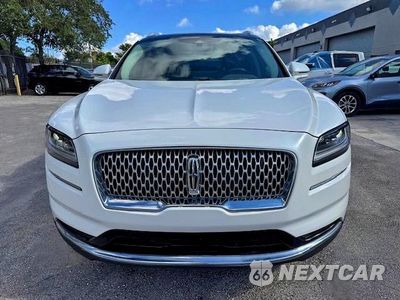 Piąte zdjęcie samochodu w środku: 2021 LINCOLN NAUTILUS RESERVE VIN:2LMPJ8K90MBL12748 - miniatura