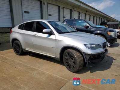 Czwarte zdjęcie samochodu z boku: 2012 BMW X6 XDRIVE35I VIN:5UXFG2C53CL780148 - miniatura