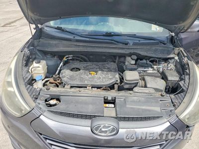 Zdjęcie 12 z 13 samochodu: 2014 HYUNDAI TUCSON GLS VIN:KM8JTCAF1EU950766 - miniatura