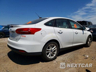 Trzecie zdjęcie samochodu z tyłu: 2016 FORD FOCUS SE VIN:1FADP3F27GL348982 - miniatura