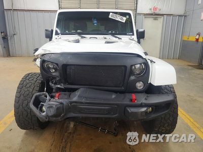 Piąte zdjęcie samochodu w środku: 2015 JEEP WRANGLER UNLIMITED RUBICON VIN:1C4BJWFG5FL769825 - miniatura