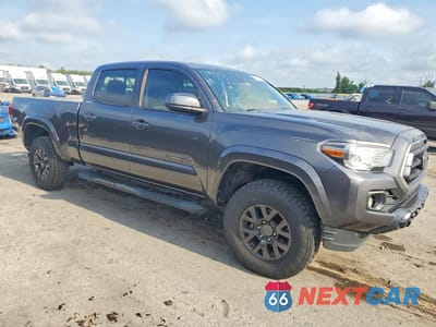 Czwarte zdjęcie samochodu z boku: 2022 TOYOTA TACOMA SR5 V6 VIN:3TYDZ5BN6NT015463 - miniatura