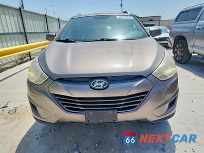Piąte zdjęcie samochodu w środku: 2011 HYUNDAI TUCSON GLS VIN:KM8JU3AC6BU261837 - miniatura