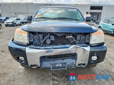 Piąte zdjęcie samochodu w środku: 2012 NISSAN TITAN SV VIN:1N6AA0EC2CN323491 - miniatura