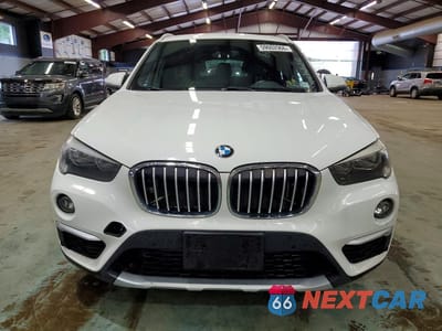 Piąte zdjęcie samochodu w środku: 2018 BMW X1 XDRIVE28I VIN:WBXHT3C34J5L30734 - miniatura